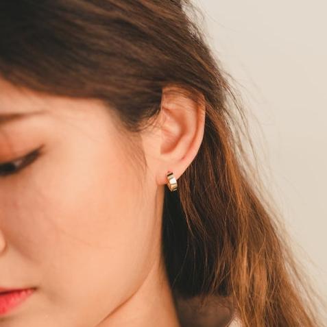 Round hoop earrings in gold vermeil on sterling silver, 10mm diameter, 1-3mm thick. Hinged closure for secure fit. Smooth, polished finish. Lightweight and comfortable for cartilage, daith, rook or helix piercings.